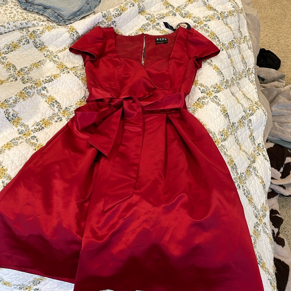 This is a gorgeous satin red dress. It’s a size 4.